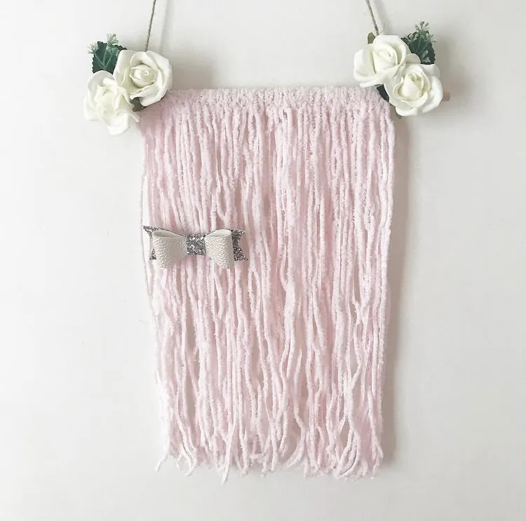 Handmade wooden/woolen bow holder