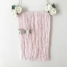 Handmade wooden/woolen bow holder