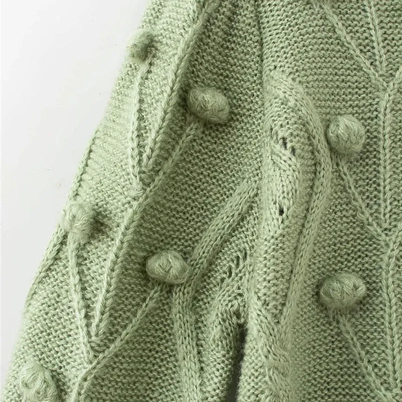 KNITTED SWEATER